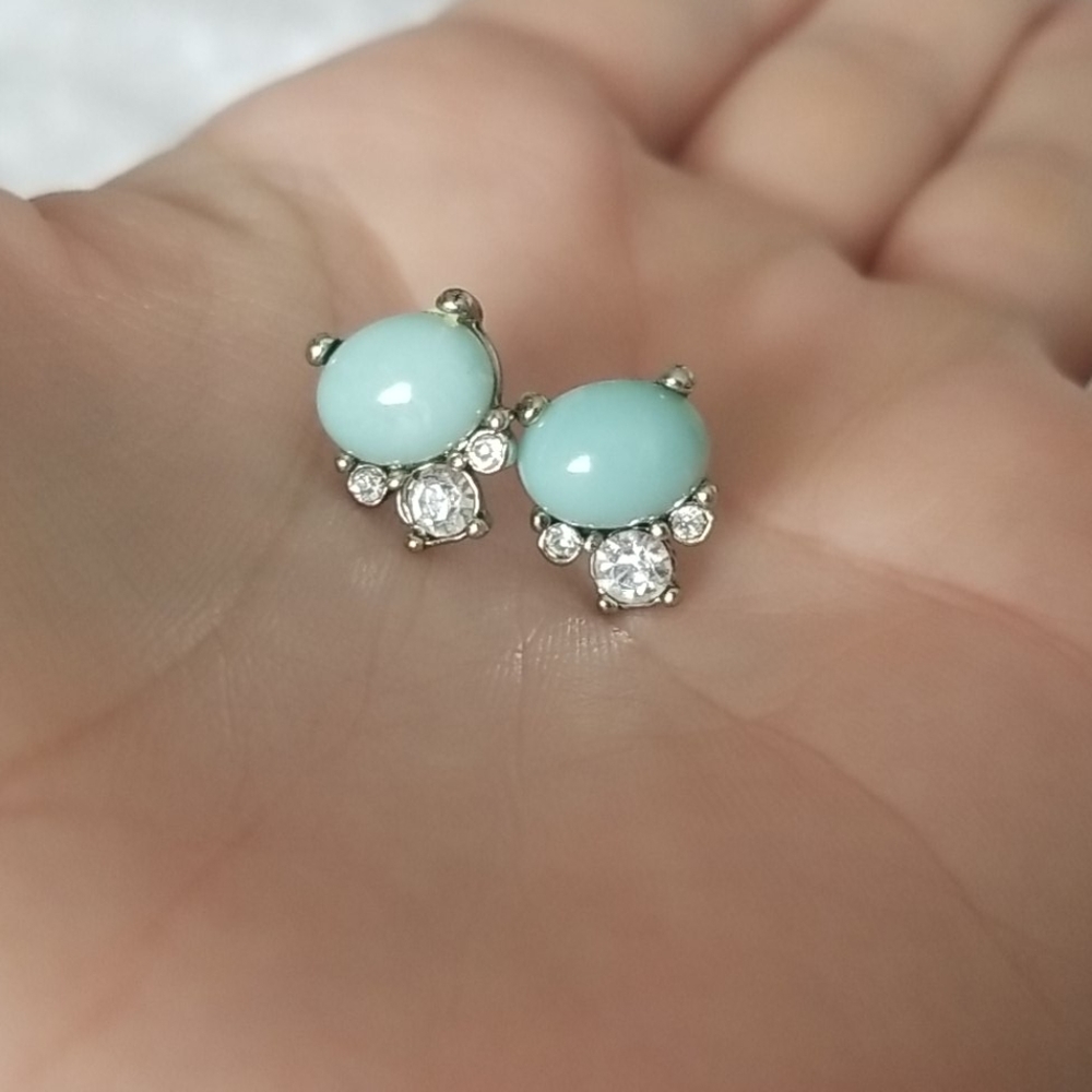 Turquoise colored and white jewel earrings